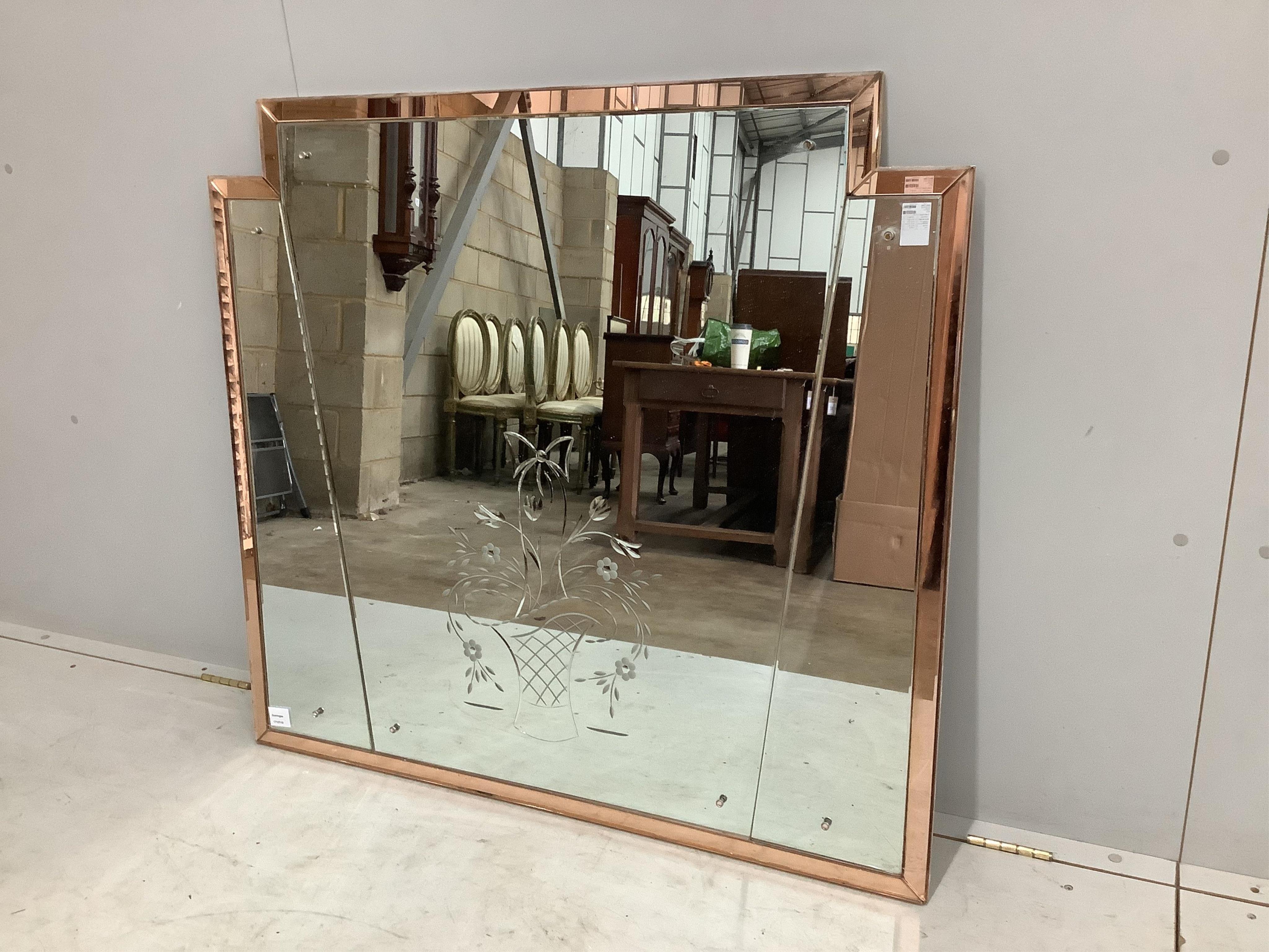 An Art Deco style engraved, peach and clear glass overmantel mirror, width 108cm, height 101cm. Condition - fair